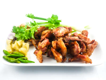 Fried pork with a vegetable side dish - soft focusの写真素材