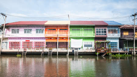 Colorful houses around Maeklong river in Samut Songkhram, Thailand. Long exposure photographyの写真素材