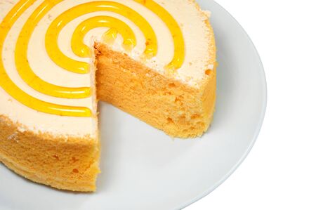 Sponge cake on white plate isolated on white backgroundの写真素材