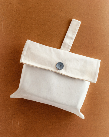 Fabric bag cover with holder on brown eco backgroundの写真素材