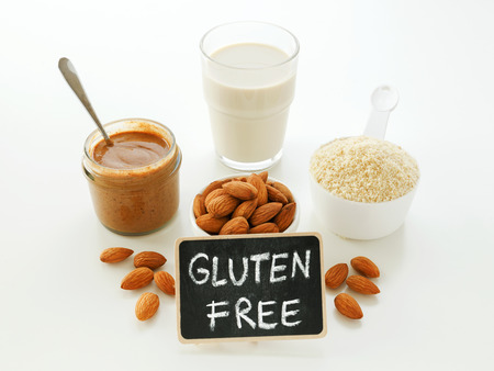 Almonds with almond milk flour butter and gluten free signの写真素材