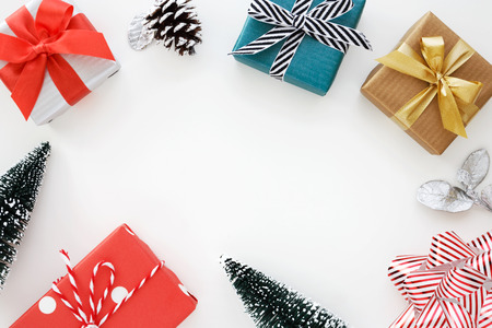 Christmas gift boxes on white background with copy spaceの写真素材