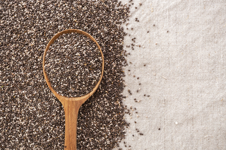 Chia seeds in spoon  texture and background with spaceの写真素材
