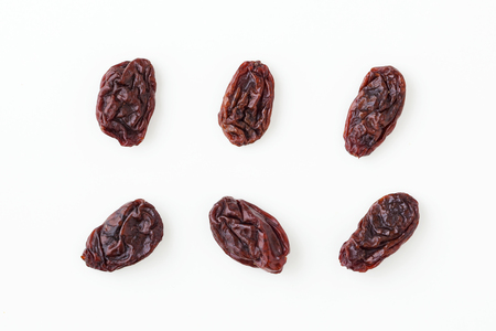 Raisins isolated on white background, top viewの写真素材