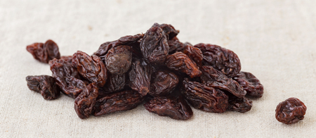 Dried raisins closeup on tableの写真素材