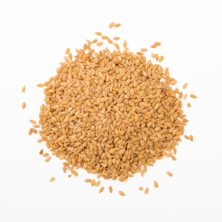 Golden flaxseed isolated on white background, top viewの写真素材