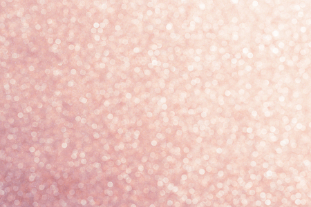 Pink gold bokeh background, defocused glitterの写真素材
