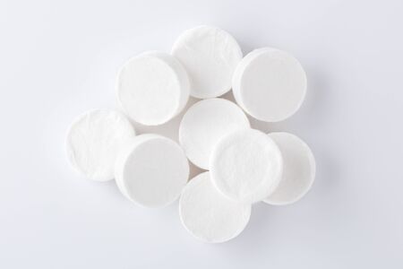 Compressed facial mask sheet on white background, top viewの写真素材