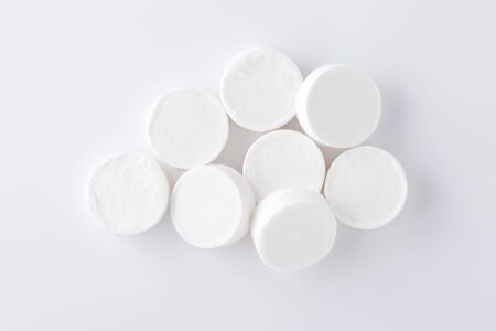 Compressed facial mask sheets on white background, top viewの写真素材