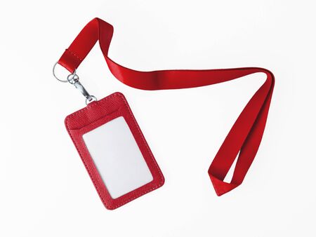 Leather badge and red lanyard isolated on white backgroundの写真素材