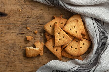 Homemade baked shortbread biscuit on rustic wood table, top viewの写真素材
