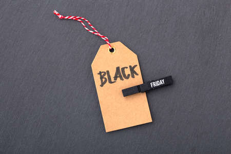 Black friday sale tag on dark stone backgroundの写真素材