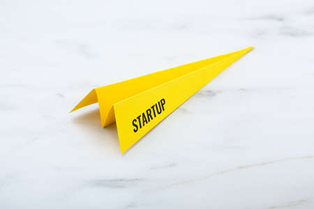 Yellow paper rocket, startup business conceptの写真素材