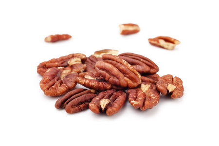 Pecans isolated on white background, closeup