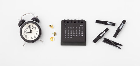 Calendar with clock on white background, top view, business schedule, event conceptの写真素材
