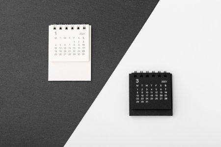 Calendar 2021 on black and white background, top viewの写真素材