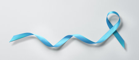 Blue ribbon on light grey background, world diabetes day, prostate cancer awareness monthの写真素材