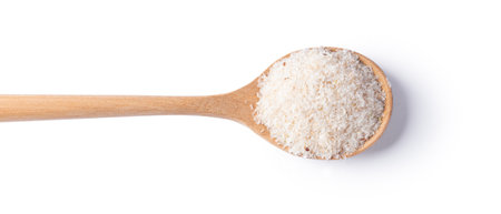 Psyllium husk in wood spoon isolated on white background, top viewの写真素材