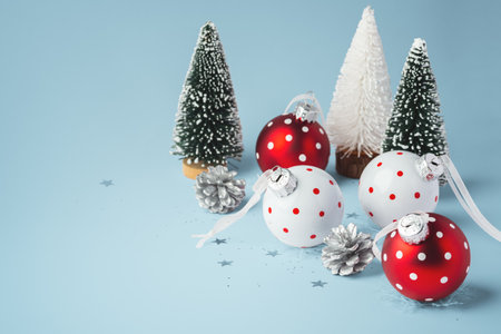 Christmas balls and tree on blue background, christmas background with copy spaceの写真素材