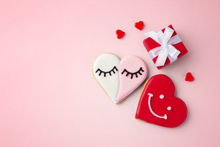 Heart cookies with gift box, valentines day on pink background, top view, copy spaceの写真素材
