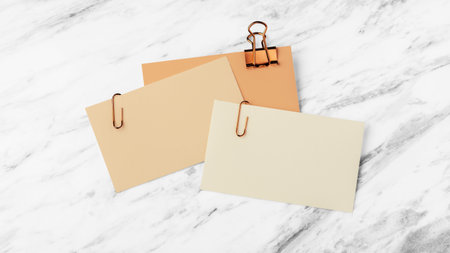 Business card, brown earth tone color with copper binder clip, mockup on white marble table...
