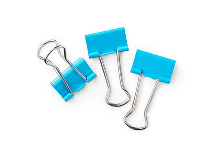 Blue binder clips isolated on white background, top viewの写真素材
