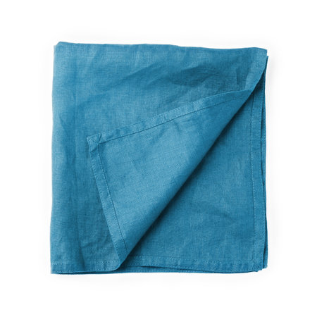 Blue linen napkin cloth folded isolated on white background, top viewの写真素材