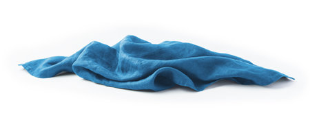 Blue linen kitchen table cloth isolated on white backgroundの写真素材