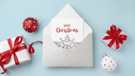 Merry Christmas holiday card in envelope and present gift boxes with red bow ribbon and xmas ball...
