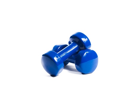 Two blue dumbbells on an isolated backgroundの写真素材