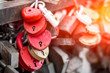 Red heart locks in one rowの写真素材