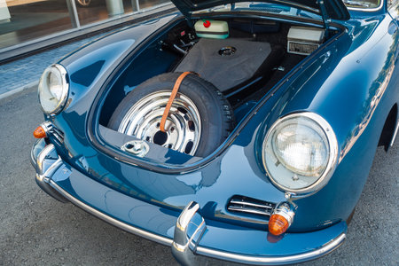 Novosibirsk, Russia - June 16, 2017: Porsche 356, close-up of car trunk with spare wheel....