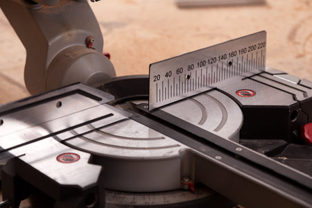 Close-up marking zone with ruler on the end circular saw