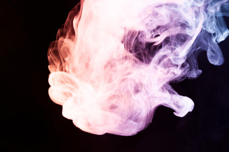 Red, blue and purple  smoke on black background