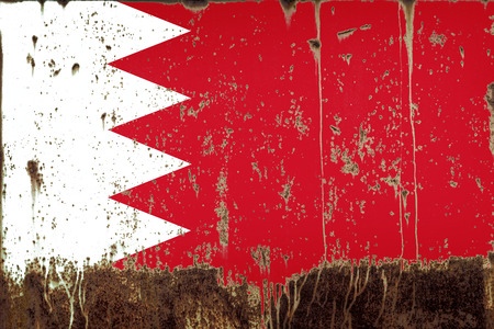 National flag of Bahrain on rusty metal textureの写真素材