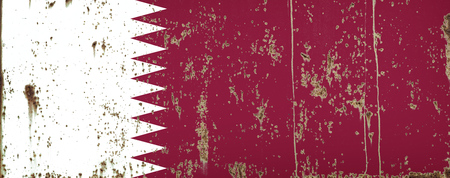 National flag of Qatar on rusty metal textureの写真素材