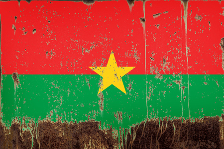 National flag of Burkino Faso on rusty metal textureの写真素材
