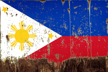 National flag of Philippines on rusty metal textureの写真素材