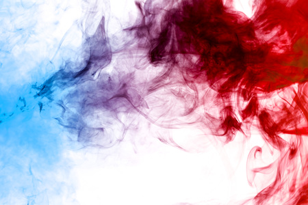 Blue and red  smoke on white backgroundの写真素材