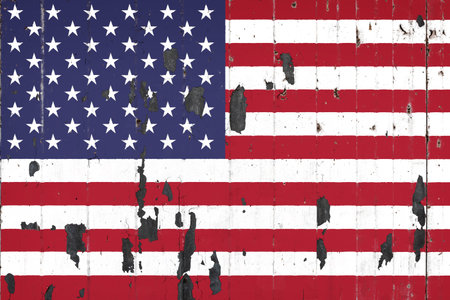 National flag of USA on the background of an old mettale covered with peeling paint
