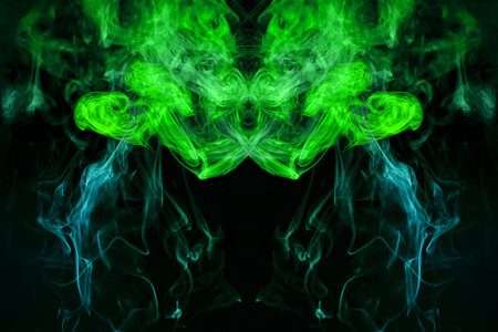 Mocap for cool t-shirts. Thick colorful green smoke  in the form of a monster on a black isolated...