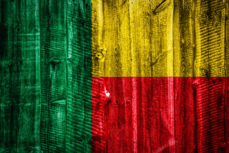 National flag of Benin on textured wooden background, fence or wallの写真素材