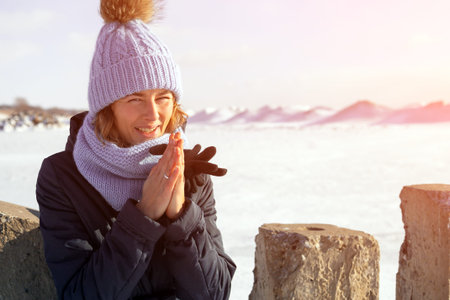 Portrait beauty woman model on winter background. Beautiful modern  young woman wearing blue...