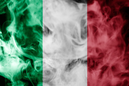 National flag of Italy from thick colored smoke on a black isolated backgroundの写真素材
