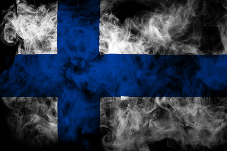 National flag of Finland from thick colored smoke on a black isolated backgroundの写真素材