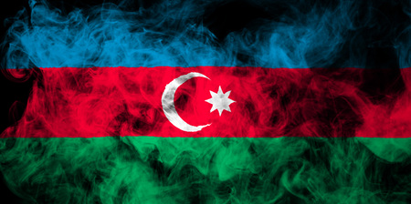 National flag of Azerbaijan from thick colored smoke on a black isolated backgroundの写真素材