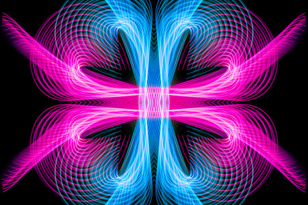 Abstract motion graphics with colored blue and pink spirals and fractals on a black background ....