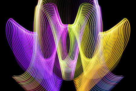 Abstract rainbow neon glowing crossing lines pattern. DarkÂ  background of colorful neon yellow,...