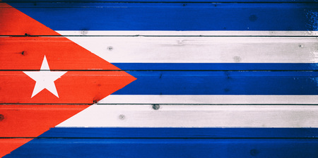 National flag of Cuba  on a  wooden backgroundの写真素材