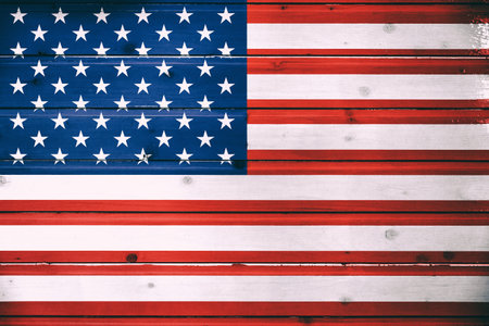 National flag of USA on a  wooden background
